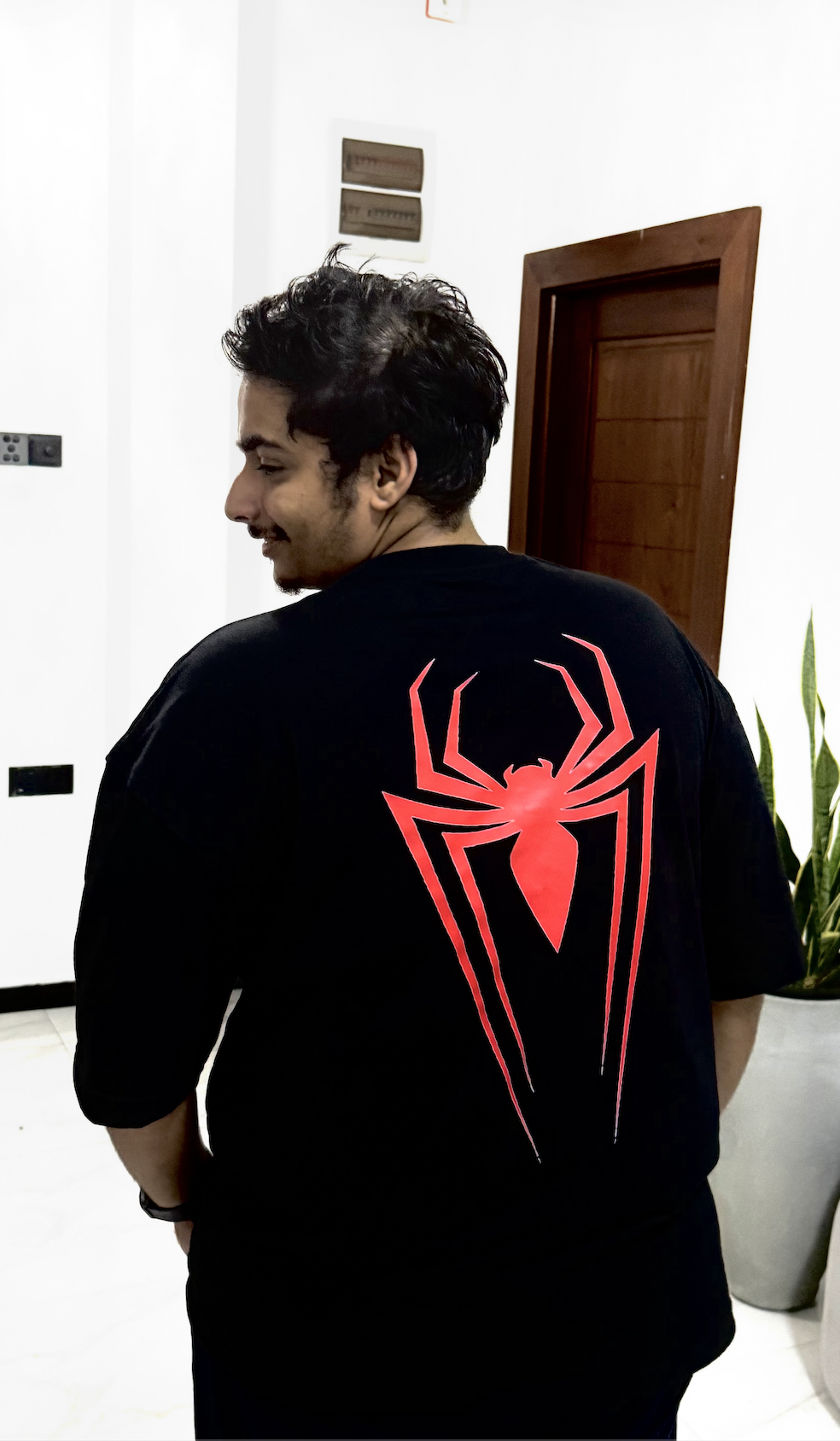 Customer wearing the Respawned Spider-Man tee